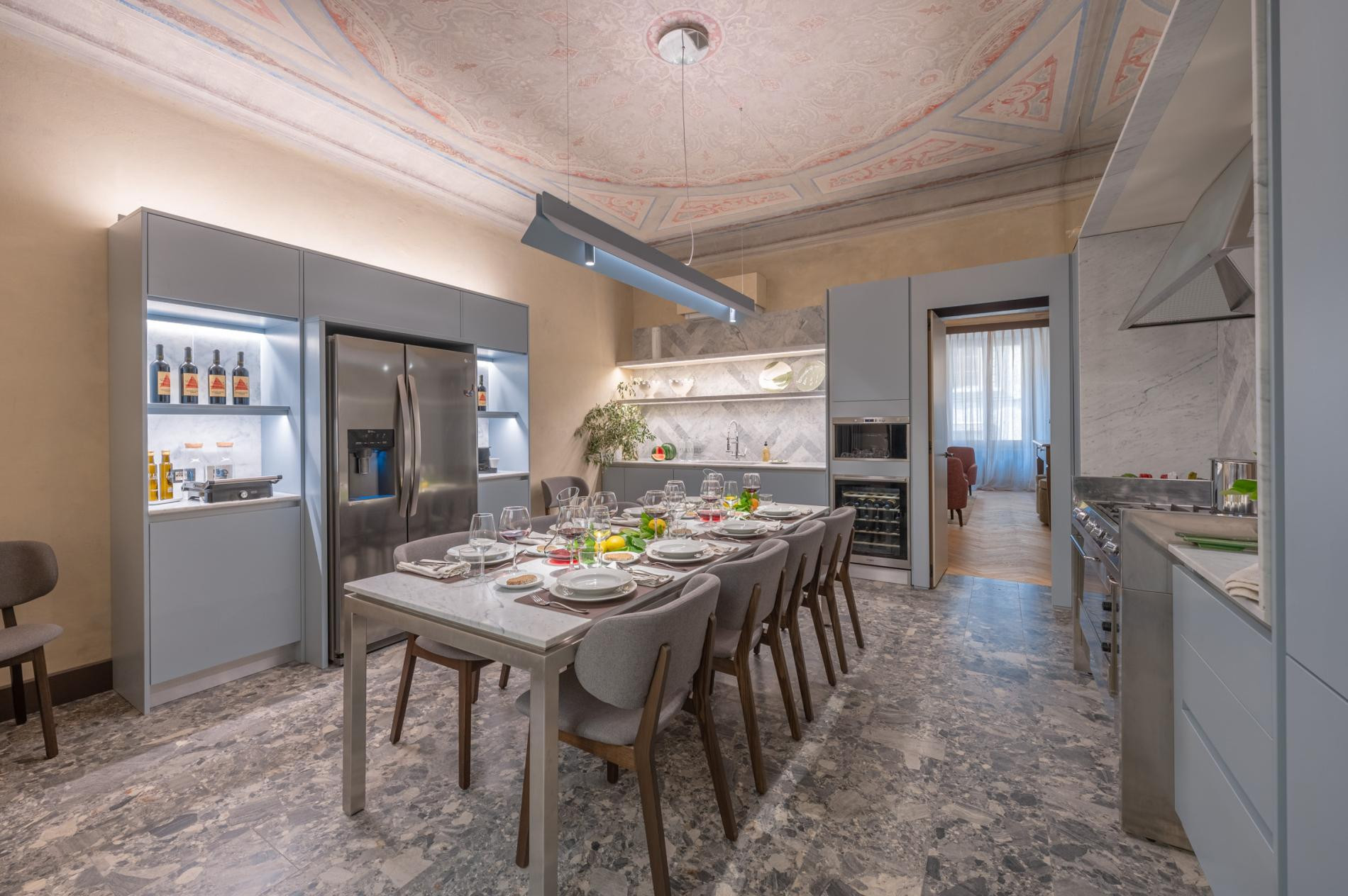 Eat-in kitchen and dining table at the Belcortese apartment in Florence