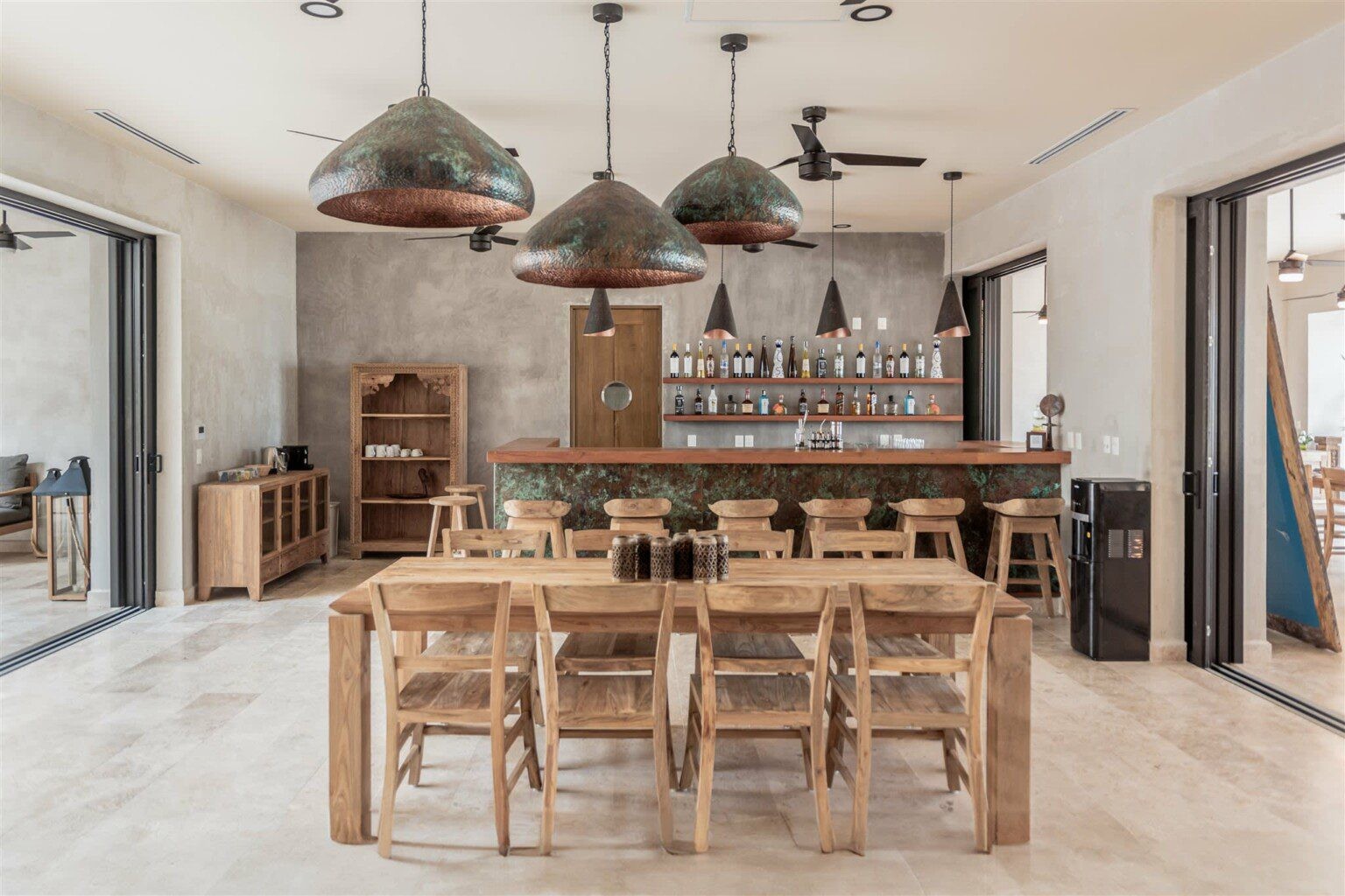 Dining and kitchen area at Hacienda Jaguar villa in Puerto Aventuras