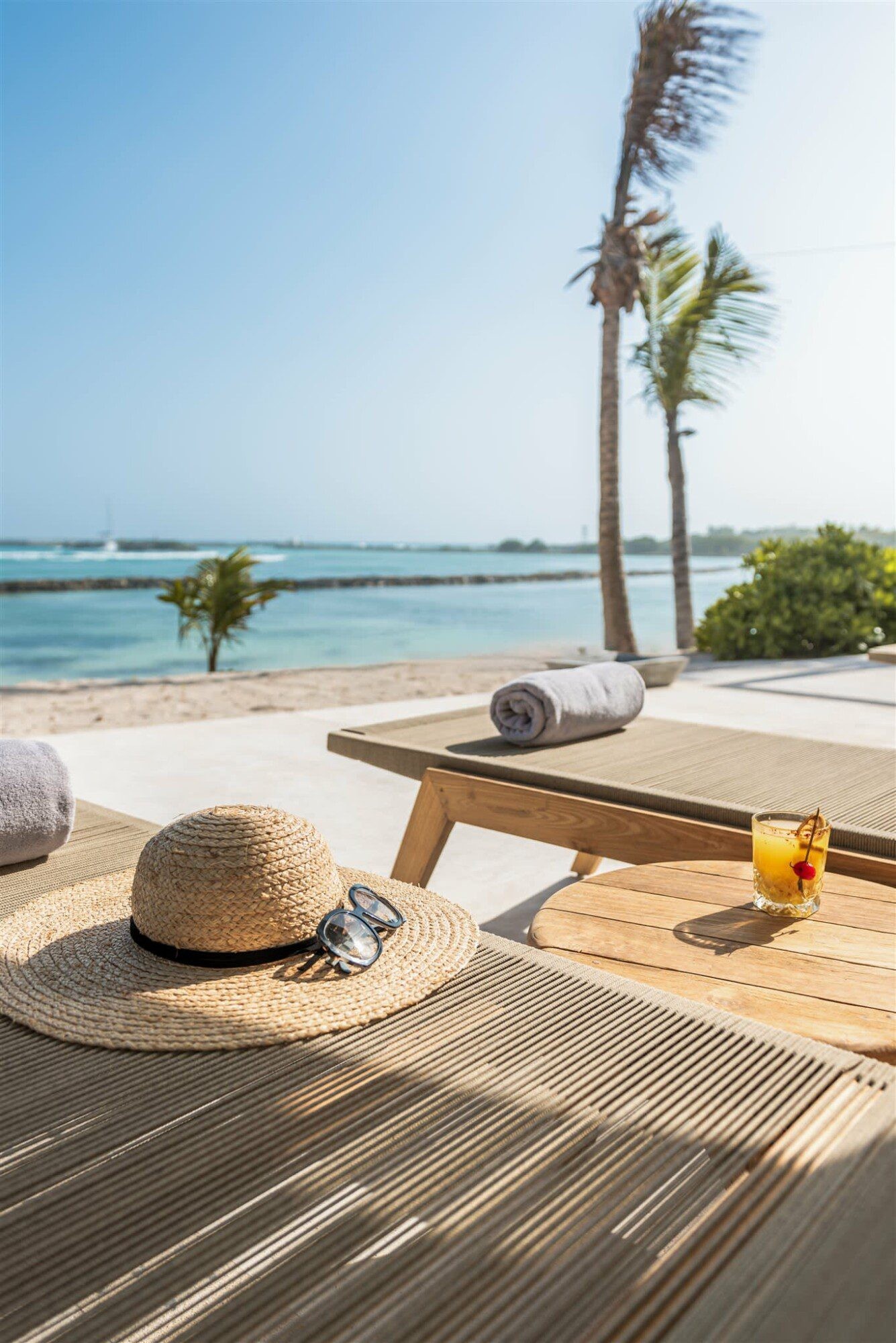 Palm-fringed beachfront at Hacienda Jaguar on Fatima Bay in Riviera Maya