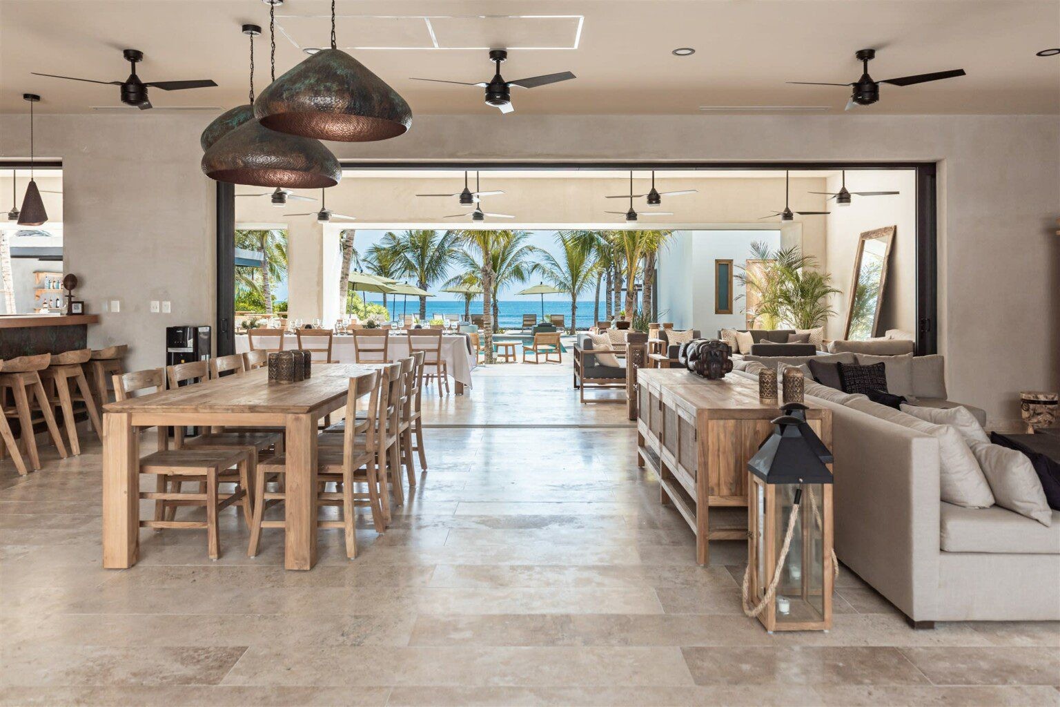 Open-concept living and dining area at Hacienda Jaguar villa in Mexico